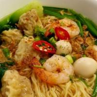 Seafood Wonton Noodle Soup · Jumbo shrimp, scallops, fish fillets, calamari, and six pieces of wontons in a  rice noodle ...