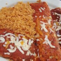Enchiladas Rancheras · Four cheese, chicken or beef enchiladas covered with red or green sauce, and topped with let...