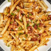 Bacon Cheese Fries · French fries, cheese, bacon, green onions. Side of ketchup and ranch.