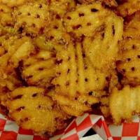 Idaho Waffle Fries · Waffle-cut potatoes fried until crispy and delicious. Fries may be lightly salted or seasone...