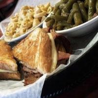 Brisket Grilled Cheese W/ 2 Sides · Lean brisket, covered in our dry rub, smoked over locally sourced Hickory and served on Texa...