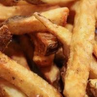 French Fries · Hand cut french fries, fried to perfection and covered in our signature dry rub.