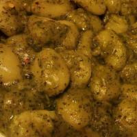 Gnocchi Con Pesto Alfredo · Potato dumpling tossed in our homemade pesto alfredo sauce. Add grilled chicken for an addit...
