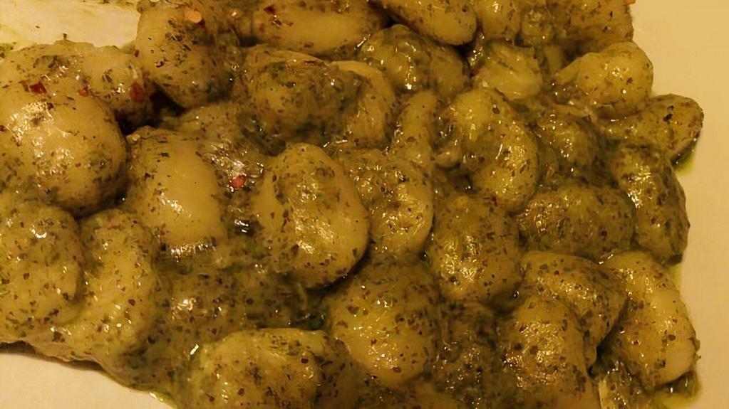 Gnocchi Con Pesto Alfredo · Potato dumpling tossed in our homemade pesto alfredo sauce. Add grilled chicken for an additional cost.