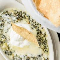 Spinach & Artichoke Dip · Served with tortilla chips