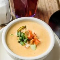 Crawfish Queso Dip · Served with tortilla chips