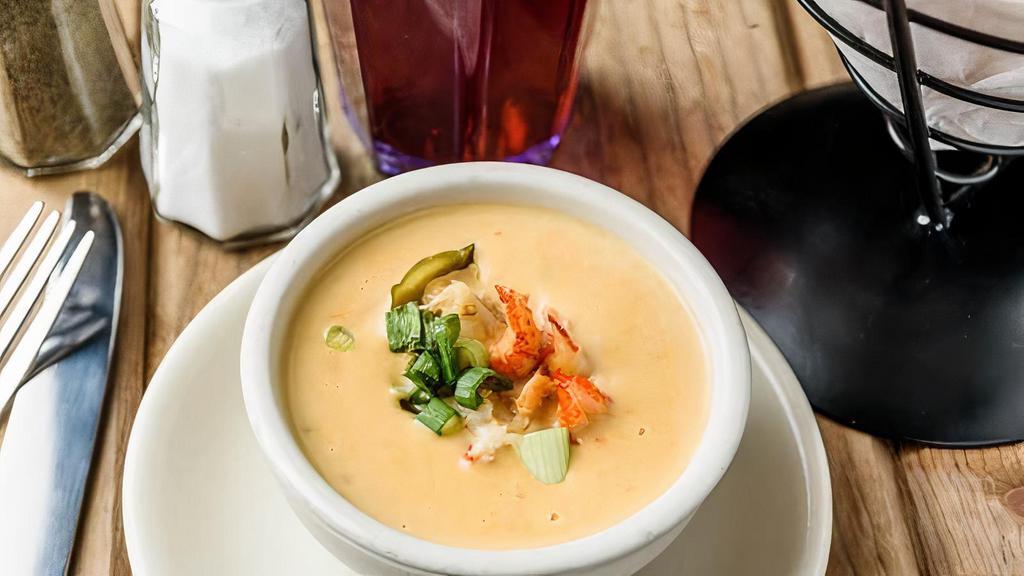 Crawfish Queso Dip · Served with tortilla chips