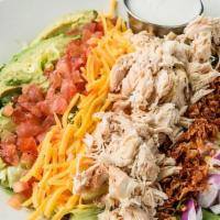 Cobb Salad · Grilled chicken, cheddar cheese, lettuce blend, eggs,
bacon bits, heirloom tomatoes, red oni...