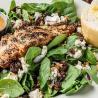 Blackened Salmon Spinach Salad · Blackened salmon, bleu cheese, spinach, red onions, pecans, raisins