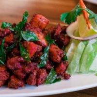 Chicken 65 · Boneless cubes of chicken marinated with a blend of Indian spices and deep friend.