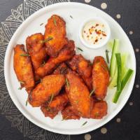 Classic Chicken Wings · (4 Pieces) Fresh chicken wings breaded and fried until golden brown.