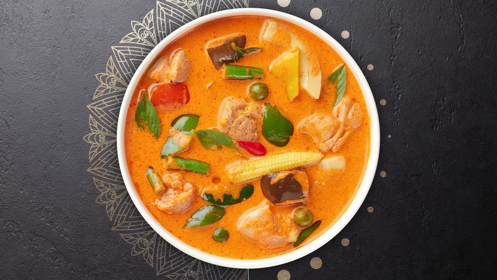 Panang Patriot Curry · Creamy red curry with cabbage, broccoli, and carrots. Served with rice.