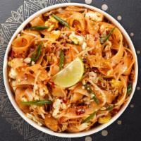 Pad Peaks Thai · Pan-fried thin rice noodles in tamarind sauce with egg, bean sprouts, green onion, and peanu...