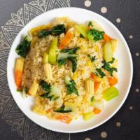 Veggie Mixer Fried Rice · Stir fried in brown sauce cabbage, broccoli, carrot, bell pepper, baby corn, bamboo, snow pe...