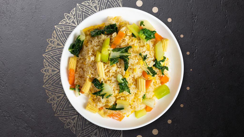 Veggie Mixer Fried Rice · Stir fried in brown sauce cabbage, broccoli, carrot, bell pepper, baby corn, bamboo, snow pea (when available) and your choice of meat.