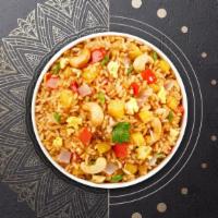 Pineapple Peaks Fried Rice · Stir-fried in our homemade sweet and sour sauce pineapple, onions, bell pepper, carrots, tom...
