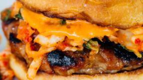 Bulgogi Kimchi Slaw Burger · Beef bulgogi patty, American cheese, kimchi slaw, grilled onion and peppers, garlic sauce, b...