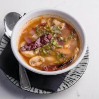 Tom Yum Soup (Chicken)- · Lemongrass, lime leaves, lime juice and galangal soup  with tomatoes, cilantro, shallots, an...