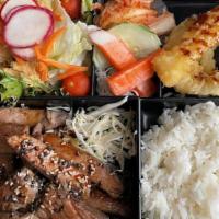 Steak Teriyaki Bento- · Tender New York strip, teriyaki sauce, mixed greens,  Japanese side dishes, served with a si...