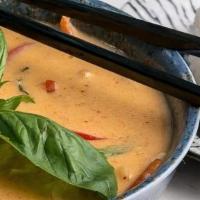 Red Curry- · Red curry mixed with a mild to medium blend of coconut milk, bell peppers, carrots, bamboo s...