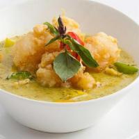 Green Curry- · Green curry blended with creamy coconut milk, carrots, eggplant, bell peppers, and fresh bas...