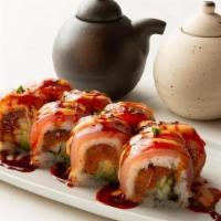 Red Fire Dragon- · Spicy tuna, avocados, cucumbers, and sesame seeds; topped with fresh tuna, spicy mayo, srira...