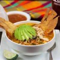 Chicken Tortilla Soup · Delicious Chicken Broth / Chicken / Served With Tortillas Chips / Rice / Avocado / Onions/ T...