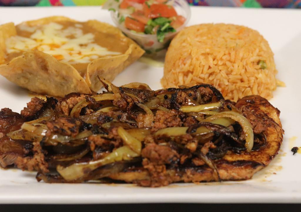 Chori Pollo · Grilled Chicken Breast Marinated Overnight / Grilled Chorizo (Mexican Sausage) / Smothered With Melted Cheese / Served With Rice / Refried Beans & Three Flour Tortillas.