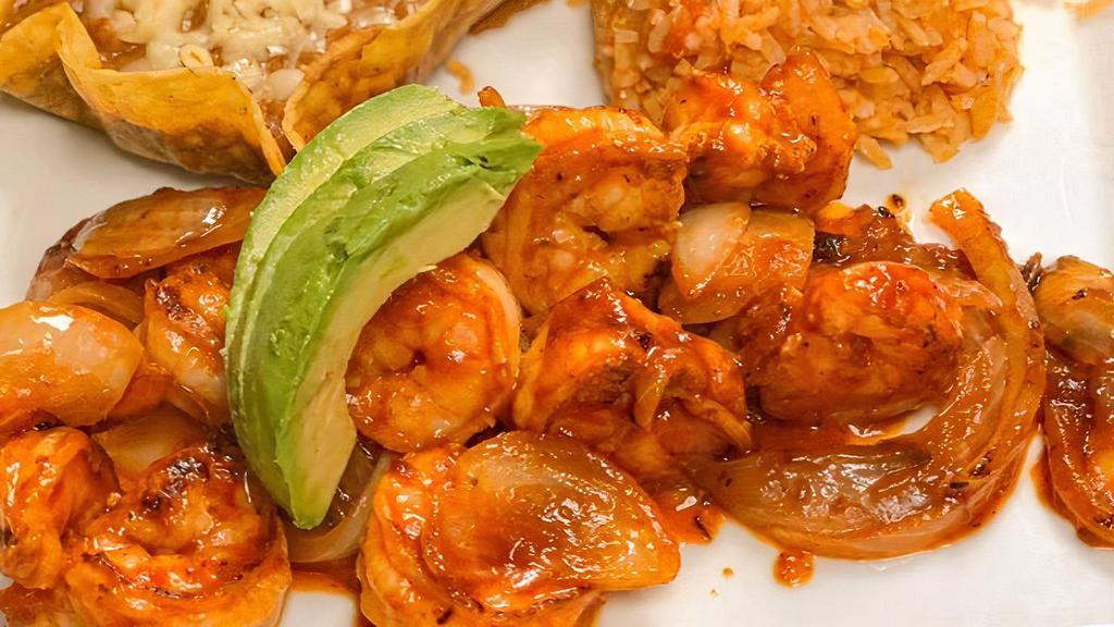 Camaron A La Diabla · 12 Grilled Shrimp / Onions / Cooked Chipotle Spicy Homemade Sauce / Served With Rice / Refried Beans / Avocado & Three Flour Tortillas.