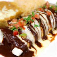 Burritos San Marcos · A 10'' Flour Tortilla / Filled With Your Choice Of Shredded Fried Pork / Grilled Chicken Or ...