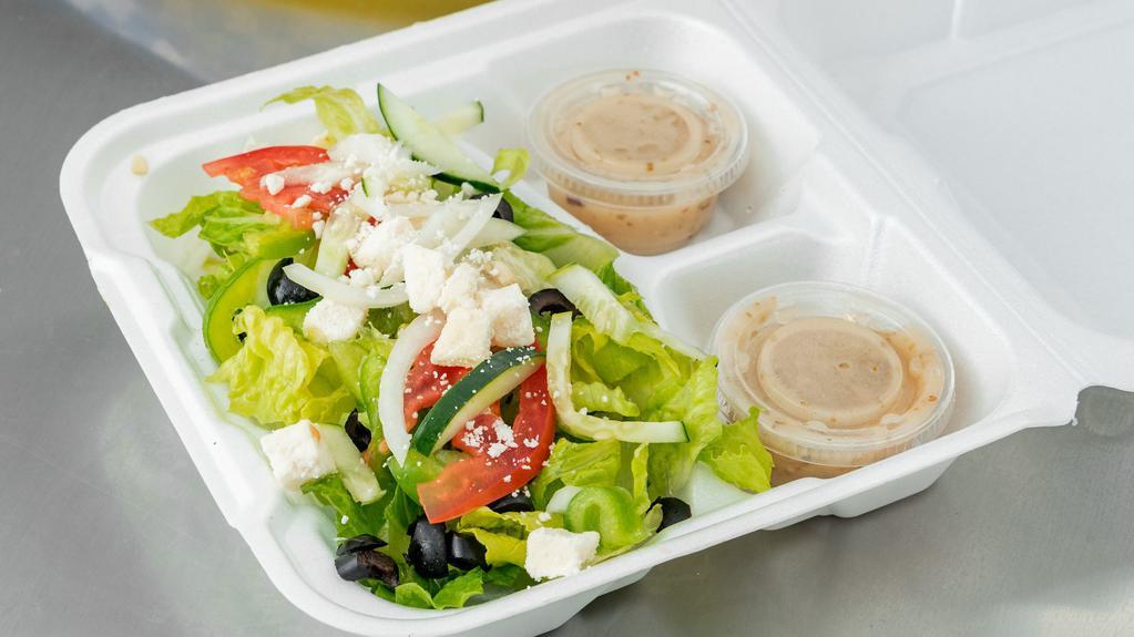 Greek Salad  · Romanian lettuce with, fresh bell peppers , onions, black olives , cucumber , tomatoes , banana peppers feta cheese with side of Greek dressing.