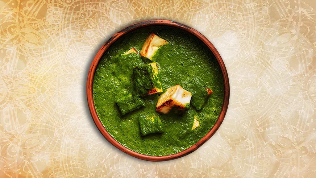 Cottage Cheese  Spinach · Indian cottage cheese cubes in a mild, spiced smooth spinach sauce and creamy dish is made with fresh spinach leaves, paneer (firm cottage cheese), onions, tomatoes, herbs and spices.