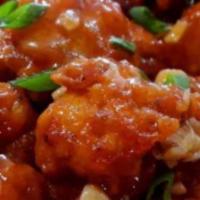 ￼Gobi Manchurian · Batter fried cauliflower tossed with tangy sauce.