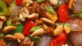 Chili Mushroom · Vegan. Hot. Crispy fried mushroom with onions, peppers & spices.