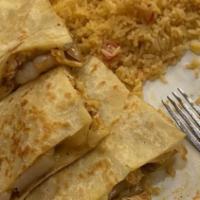Baja California Quesadilla · Grilled chicken, shrimp, and onions. Served with rice or beans.