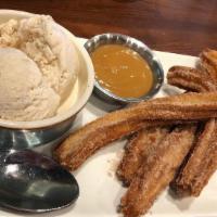 Churros · Three pineapple jelly-filled churros deeply fried and covered in cinnamon-sugar. Served with...