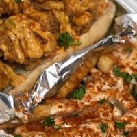 Fried Oyster Po'Boy · Served on french bread with lettuce & tomatoes. topped with A homemade remoulade sauce and c...
