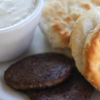 Mom'S Buttermilk Biscuits · 2 buttermilk biscuits sausage patties and a bowl of country peppered gravy.