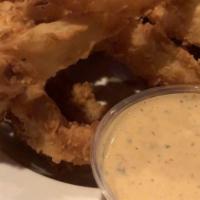 Onion Rings · Homemade hand battered onion rings.