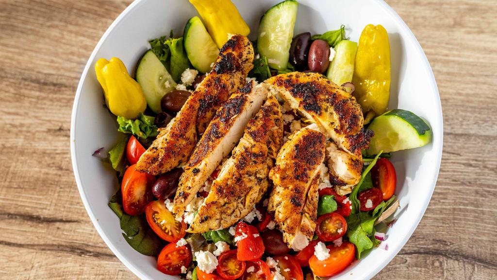 Mediterranean Salad · Mixed greens topped with grilled chicken, tomato, cucumber, red onion, kalamata olives, roasted red pepper, peperoncino and feta with Greek or raspberry vinaigrette dressing.