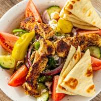 Authentic Greek Village Salad · Served with tomatoes, cucumbers, red onions, bell peppers, pepperconi, feta cheese, oregano ...