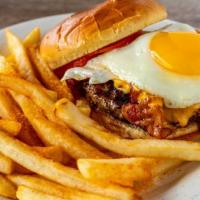 Cialis Burger (Rise To The Occasion) · Burger topped with American, bacon, tomato, mayo and a Sunnyside egg on a grilled bun.