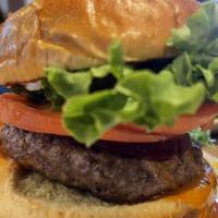 Buffalo Burger · Our custom blend burger dipped in our signature wing sauce served with lettuce, tomato, onio...