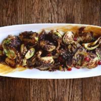 Charred Brussels Sprouts · white miso, pomegranate