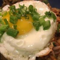 Korean Beef Stir Fried Rice · spicy house kimchi, peas, carrots, sesame, sunny up egg.