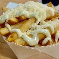 Truffle Fries  |  Gf · Our Classic Fries topped with a truffle oil aioli and parmesan cheese (truffle sauce and Par...