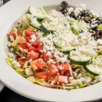 Greek Salad (Small) · A fresh garden mixture of romaine and iceberg lettuce, feta cheese, unpitted Kalamata olives...