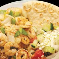 Shrimp Platter · Served with grilled shrimp and rice, your choice of salad, and pita bread.