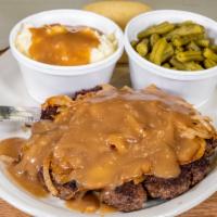 Hamburger Steak · Topped with gravy and onions served with two sides.