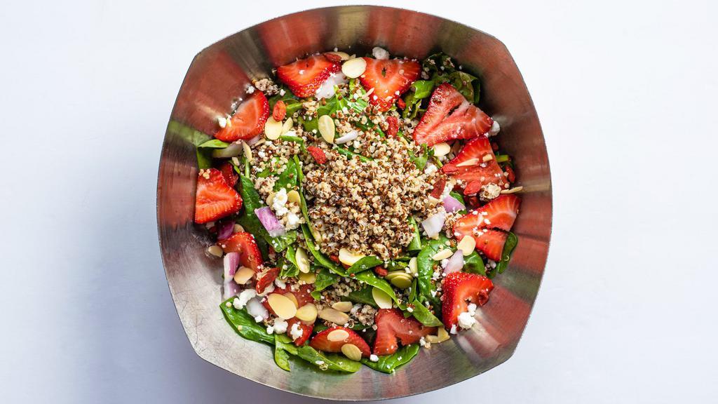 Spinach Salad · 320 cal. Spinach, quinoa, strawberries, red onion, organic goji berries, almonds, goat cheese, housemade açaí balsamic vinaigrette.
